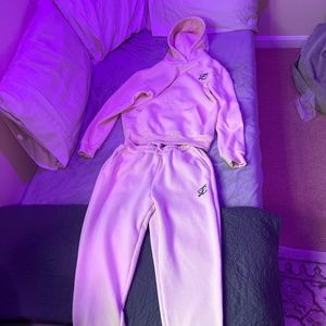 A mens small creme colored track suit from truelaces